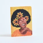 Caderno Girassol da Entrelinhas, sem pauta, com arte exclusiva de artista brasileiro
